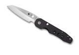 Spyderco Smock folding knife with thumb hole and flipper - shown open presentation side.  Satin S30V stainless steel plain edge blade.  Black carbon fiber and G-10 laminate handle.  Model C240CFP.