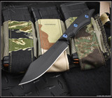 RMJ Tactical Ratatosk fixed blade knife with blue hardware installed - shown out of sheath reverse.  Graphite Black Cerakote Nitro-V stainless steel plain edge blade.  Black Micarta handle.  Model K-RT-GB-LM-BK.