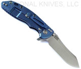 Rick Hinderer Knives XM-18 3.5" Skinner folding knife with thumb stud and flipper tab - shown open lock side.  Stonewash S45VN stainless steel plain edge blade.  Black G-10 handle with stonewash blue lock side.  Model KXM35SKINNER.