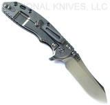 Rick Hinderer Knives XM-18 3.5" Skinner folding knife with thumb stud and flipper tab - shown open lock side.  Stonewash S45VN stainless steel plain edge blade.  OD green G-10 handle with stonewash lock side.  Model KXM35SKINNER.