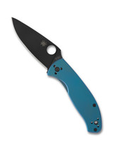Spyderco Tenacious folding knife with thumb hole - shown open presentation side.  Black 8Cr13MoV stainless steel plain edge blade.  Blue titanium handle.  Model C122TIBLBKP.
