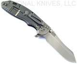 Rick Hinderer Knives XM-18 3.5" Skinner folding knife with thumb stud and flipper tab - shown open lock side.  Stonewash S45VN stainless steel plain edge blade.  Black G-10 handle with stonewash lock side.  Model KXM35SKINNER.