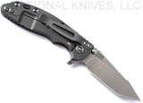 Rick Hinderer Knives XM-18 3.0" Harpoon Tanto folding knife with thumb stud and flipper tab - shown open lock side.  Stonewash S45VN stainless steel plain edge blade.  FDE G-10 handle with Working Finish lock side.  Model KXM3000HT.