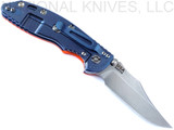 Rick Hinderer Knives Non Flipper XM-18 3.5" Bowie folding knife with thumb stud - shown open lock side.  Stonewash S45VN stainless steel plain edge blade.  Orange G-10 handle with stonewash blue lock side.  Model KXM35NFBOW.