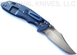 Rick Hinderer Knives Non Flipper XM-18 3.5" Bowie folding knife with thumb stud - shown open lock side.  Stonewash S45VN stainless steel plain edge blade.  Blue - black G-10 handle with stonewash blue lock side.  Model KXM35NFBOW.