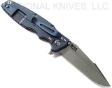 Rick Hinderer Knives Eklipse Harpoon Spanto folding knife with flipper tab and thumb stud - shown open lock side.  Working Finish S45VN stainless steel plain edge blade.  Coyote G-10 handle with Battle Blue lock side.  Model KEK35HSA.