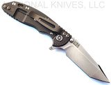 Rick Hinderer Knives XM-18 3.0" Harpoon Tanto folding knife with thumb stud and flipper tab - shown open lock side.  Stonewash S45VN stainless steel plain edge blade.  Translucent Green G-10 handle with Battle Bronze lock side.  Model KXM3000HT.