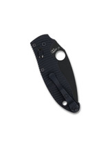 Spyderco Manix 2 Salt folding knife with thumb hole - shown closed pocket clip side.  Black MagnaCut stainless steel plain edge blade.  Black G-10 handle.  Model C101GMCBKP2.