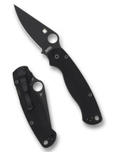 Spyderco Paramilitary 2 folding knife with thumb hole - shown open presentation side and closed pocket clip side.  Black S45VN stainless steel plain edge blade.  Black G-10 handle.  Model C81GPBK2.