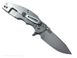 Rick Hinderer Knives Jurassic Hollow Grind Slicer folding knife with flipper tab - shown open lock side.  Stonewash MagnaCut stainless steel plain edge blade.  Translucent Green G-10 handle scale with stonewash titanium lock side.  Model KJURSLHO.