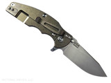 Rick Hinderer Knives Jurassic Hollow Grind Slicer folding knife with flipper tab - shown open lock side.  Stonewash MagnaCut stainless steel plain edge blade.  Coyote G-10 handle scale with stonewash bronze titanium lock side.  Model KJURSLHO.