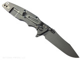 Rick Hinderer Knives Skinny Eklipse Slicer folding knife with flipper tab - shown open - lock side.  Working Finish 3.5" hollow grind MagnaCut stainless steel plain edge blade.  Blue G-10 handle scale with Working Finish lock side.  Model KEK35SKSLHO