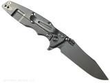 Rick Hinderer Knives Skinny Eklipse Slicer folding knife with flipper tab - shown open - lock side.  Working Finish 3.5" hollow grind MagnaCut stainless steel plain edge blade.  Black G-10 handle scale with Working Finish lock side.  Model KEK35SKSLHO
