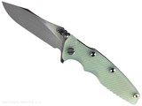 Rick Hinderer Knives Skinny Eklipse Slicer folding knife with flipper tab - shown open - presentation side. Stonewash 3.5" hollow grind MagnaCut stainless steel plain edge blade. Translucent Green G-10 handle scale with stonewashed bronze lock side. Model KEK35SKSLHO Rick Hinderer Knives Skinny Eklipse Slicer folding knife with flipper tab - shown open - presentation side. Stonewash 3.5" hollow grind MagnaCut stainless steel plain edge blade. Translucent Green G-10 handle scale with stonewashed bronze lock side. Model KEK35SKSLHO