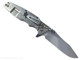 Rick Hinderer Knives Skinny Eklipse Slicer folding knife with flipper tab - shown open - lock side.  Stonewash 3.5" hollow grind MagnaCut stainless steel plain edge blade.  Translucent Green G-10 handle scale with stonewashed lock side.  Model KEK35SKSLHO