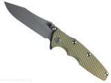 Rick Hinderer Knives Skinny Eklipse Slicer folding knife with flipper tab - shown open - presentation side. Working Finish 3.5" hollow grind MagnaCut stainless steel plain edge blade. OD green G-10 handle scale with Battle Blue lock side. Model KEK35SKSLHO Rick Hinderer Knives Skinny Eklipse Slicer folding knife with flipper tab - shown open - presentation side. Working Finish 3.5" hollow grind MagnaCut stainless steel plain edge blade. OD green G-10 handle scale with Battle Blue lock side. Model KEK35SKSLHO