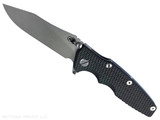 Rick Hinderer Knives Skinny Eklipse Slicer folding knife with flipper tab - shown open - presentation side. Working Finish 3.5" hollow grind MagnaCut stainless steel plain edge blade. Black G-10 handle scale with Battle Blue lock side. Model KEK35SKSLHO Rick Hinderer Knives Skinny Eklipse Slicer folding knife with flipper tab - shown open - presentation side. Working Finish 3.5" hollow grind MagnaCut stainless steel plain edge blade. Black G-10 handle scale with Battle Blue lock side. Model KEK35SKSLHO