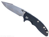 Rick Hinderer Knives XM-18 Skinny Harpoon Spanto with thumb stud and flipper tab - shown open presentation side. Stonewash Magnacut stainless steel plain edge blade. Black G-10 handle with stonewash lock side. Model KXM35SKHS. Rick Hinderer Knives XM-18 Skinny Harpoon Spanto with thumb stud and flipper tab - shown open presentation side. Stonewash Magnacut stainless steel plain edge blade. Black G-10 handle with stonewash lock side. Model KXM35SKHS.