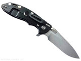 Rick Hinderer Knives XM-18 3.5" Slicer Hollow Grind folding knife with thumb stud and flipper tab - shown open lock side.  Stonewash 20CV stainless steel plain edge blade.  Black G-10 handle with Stonewash Black DLC lock side.  Model KXM35SLDLC.