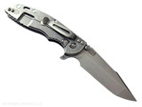 Rick Hinderer Knives XM-18 3.5" Harpoon Spanto folding knife with thumb stud and flipper tab - shown open lock side.  Stonewashed MagnaCut stainless steel plain edge blade.  Black G-10 handle with stonewash lock side.  Model KXM35HS.