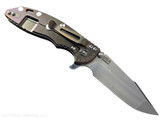 Rick Hinderer Knives XM-18 3.5" Harpoon Spanto folding knife with thumb stud and flipper tab - shown open lock side.  Stonewashed MagnaCut stainless steel plain edge blade.  Black G-10 handle with stonewash bronze lock side.  Model KXM35HS.