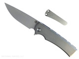 Chaves Knives Liberation Street Integral folding knife featuring a flipper tab - shown open presentation side. Stonewash M390 stainless steel drop point style plain edge blade. Stonewash titanium handle. Model CK-2B1-1B1A-1A0! Chaves Knives Liberation Street Integral folding knife featuring a flipper tab - shown open presentation side. Stonewash M390 stainless steel drop point style plain edge blade. Stonewash titanium handle. Model CK-2B1-1B1A-1A0!