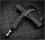 RMJ Tactical Gym Rat fixed blade knife - shown out of sheath reverse.  Graphite Black Cerakote Nitro-V stainless steel plain edge blade.  Black G- 10 handle.  Model K-GR-GB-BK.