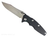 Rick Hinderer Knives Skinny Eklipse Slicer folding knife with flipper tab - shown open - presentation side. Stonewash 3.5" hollow grind MagnaCut stainless steel plain edge blade. Black G-10 handle scale with stonewash lock side. Model KEK35SKSLHO Rick Hinderer Knives Skinny Eklipse Slicer folding knife with flipper tab - shown open - presentation side. Stonewash 3.5" hollow grind MagnaCut stainless steel plain edge blade. Black G-10 handle scale with stonewash lock side. Model KEK35SKSLHO