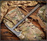 RMJ Tactical Eagle Talon limited edition tomahawk - shown out of sheath obverse. Tungsten Cerakote S7 steel plain edge head. Hyena Brown G-10 handle. Model T-ET-S7-TU-HB. RMJ Tactical Eagle Talon limited edition tomahawk - shown out of sheath obverse. Tungsten Cerakote S7 steel plain edge head. Hyena Brown G-10 handle. Model T-ET-S7-TU-HB.
