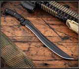 RMJ Tactical Drake fixed blade knife - shown out of sheath obverse. Textured Black MagnaCut steel plain edge blade. Black G-10 handle scales. Model K-DR-MC-BT-BK. RMJ Tactical Drake fixed blade knife - shown out of sheath obverse. Textured Black MagnaCut steel plain edge blade. Black G-10 handle scales. Model K-DR-MC-BT-BK.