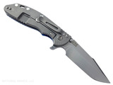 Rick Hinderer Knives XM-24 Harpoon Spanto folding knife with thumb stud and flipper tab - shown open lock side.  Stonewash S45VN stainless steel plain edge blade.  Blue G-10 handle with Working Finish lock side.  Model KXM40HS.
