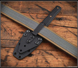 RMJ Tactical Orlando Special fixed blade knife - shown in sheath reverse.  Tungsten Cerakote MagnaCut stainless steel plain double edge blade.  Black G-10 handle.  Model K-OS-MC-TU-BK.
