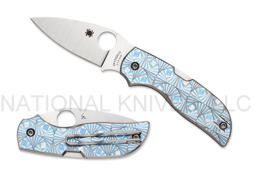 Spyderco Chaparral folding knife with thumb hole - shown open presentation side and closed pocket clip side.  Satin CTS-XHP stainless steel plain edge blade. Blue stepped titanium handle.  Model C152STIBLP.
For reference only.