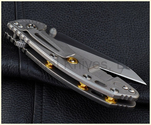 Rick Hinderer Knives Standoffs to fit XM-24 - shown installed on knife.  Brass construction.  Model K220310500.