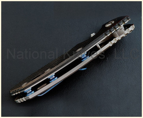 Rick Hinderer Knives Standoffs to fit XM-24 - shown installed on knife.  Stonewash blue titanium construction.  Model K2203101BL.