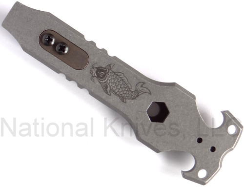 Rick Hinderer Knives HS TacTool Steel Flame pocket tool - shown obverse.  Working Finish titanium construction.  Model T9000000CC.
For reference only.