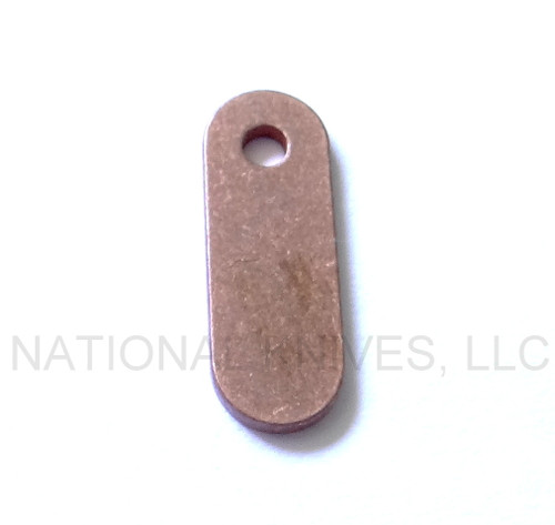 Rick Hinderer Knives 1-Hole Filler Tab - obverse.  Copper construction.  Model K0010006SF-P.