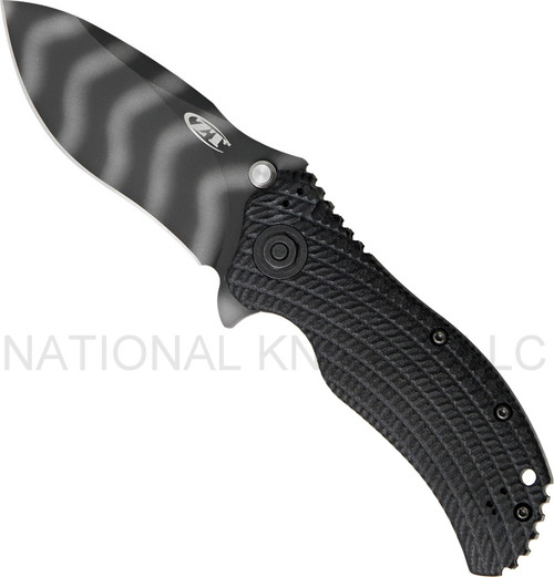 Zero Tolerance 0303 assisted opening folding knife with flipper tab and thumb stud - shown open presentation side.  Tiger striped S30V stainless steel plain edge blade.  Black G-10 handle with black titanium lock side.  Model 0303.
For reference only.