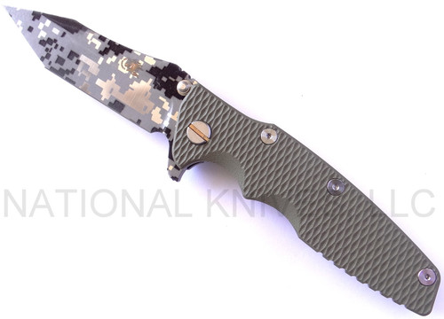 Rick Hinderer Knives Digi Camo Edition Eklipse Harpoon Tanto folding knife with thumb stud and flipper tab - shown open presentation side.  Working Finish 20CV stainless steel plain edge blade.  OD green G-10 handle with Working Finish lock side.  Model K40042S000.
For reference only.
