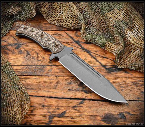 RMJ Tactical Combat Africa fixed blade knife - shown out of sheath.  Tungsten Cerakote 80CrV2 steel plain edge blade.  Hyena Brown G-10 handle scales.  Model K-CA-TU-HB.