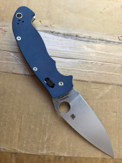 Blemished Spyderco Manix 2 XL folding knife with thumb hole - shown open presentation side.  Satin SPY27 steel plain edge blade.  Blue G-10 handle.  Model C95GPCBL2.