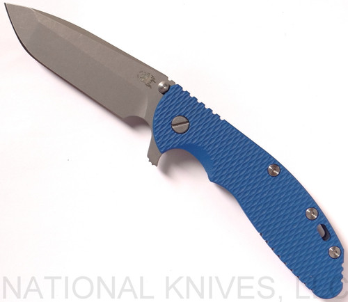 Rick Hinderer Knives XM-24 Spanto folding knife with thumb stud and flipper tab - shown open presentation side.  Working Finish 20CV stainless steel plain edge blade.  Blue G-10 handle with Battle Blue lock side.  Model K3003SGW00.