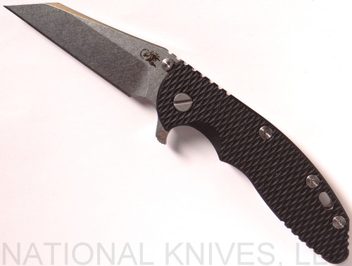 Rick Hinderer Knives XM-18 Fatty 3.5" Wharncliffe folding knife with thumb stud and flipper tab - shown open presentation side.  Stonewash 20CV stainless steel plain edge blade.  Black G-10 handle with stonewash titanium lock side.  Model K2026SGS00.