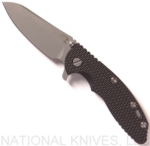 Rick Hinderer Knives XM-18 3.5" Sheepsfoot folding knife with thumb stud and flipper tab - shown open presentation side.  Working Finish 20CV stainless steel plain edge blade.  Black G-10 handle with Working Finish lock side.  Model K2522SGW00.
