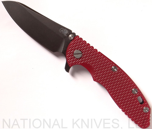 Rick Hinderer Knives XM-18 3.5" Sheepsfoot folding knife with thumb stud and flipper tab - shown open presentation side.  Battle Black 20CV stainless steel plain edge blade.  Red G-10 handle with Battle Black lock side.  Model K2522SGDBK.

