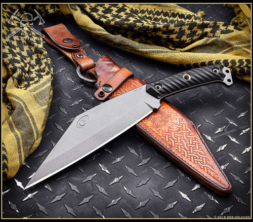 RMJ Tactical Combat Valhalla Seax fixed blade knife - shown out of sheath reverse.  Nitro-V stainless steel plain edge blade.  Black G-10 handle.
For reference only.