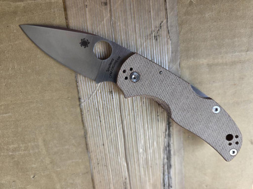 Blemished Spyderco Native 5 folding knife with thumb hole - shown open presentation side.  Satin CPM CruWear steel plain edge blade.  Brown Micarta handle.  Model C41MPCW5.