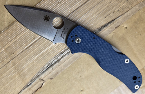 Used Spyderco Native 5 folding knife with thumb hole - shown open presentation side.  Satin SPY27 stainless steel plain edge blade.  Cobalt Blue G-10 handle.  Model C41GPCBL5.