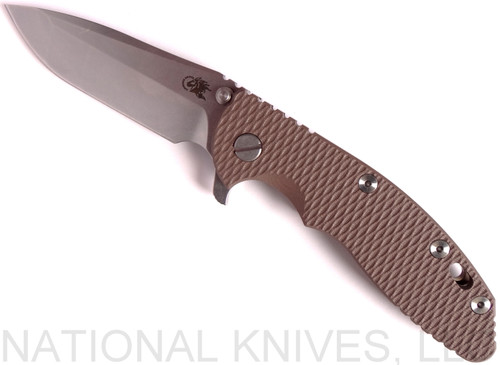 Rick Hinderer Knives XM-18 3.5" Spanto folding knife with thumb stud and flipper tab - shown open presentation side.  Stonewash 20CV stainless steel plain edge blade.  FDE G-10 handle with stonewash bronze lock side.  Model K2002SGSBR.