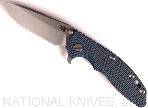 Rick Hinderer Knives XM-18 3.5" Spear Point folding knife with thumb stud and flipper tab - shown open presentation side.  Stonewash 20CV stainless steel plain edge blade.  Blue - black G-10 handle with stonewash blue lock side.  Model K2082SGS00.